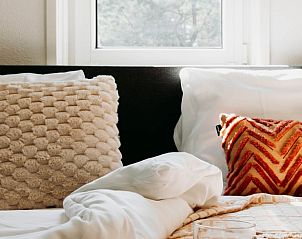 Comfortable beds in Cottage in Nunspeet, Veluwe, with soft pillows and a warm blanket.