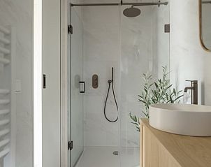 Stylish bathroom in Holiday Home in Nunspeet with modern amenities.