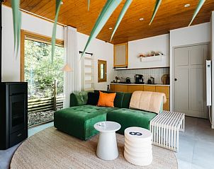 Comfortable sitting area with green view in Holiday home in Nunspeet, Veluwe, Gelderland.