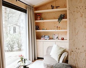 Cozy interior of Holiday home in Nunspeet with a view of the Veluwe nature, perfect for relaxation and comfort in Gelderland.
