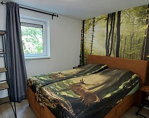 Komfortables Schlafzimmer in einem Ferienhaus in Nunspeet, Veluwe, mit schner Natur in Gelderland.
