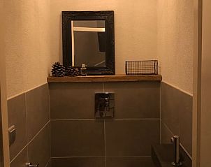 Cozy bathroom in Holiday home in Nunspeet, Veluwe, with modern amenities.