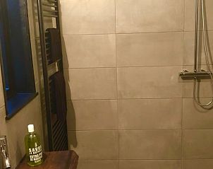 Modern shower in Holiday home in Nunspeet, Veluwe, with stylish tiles.