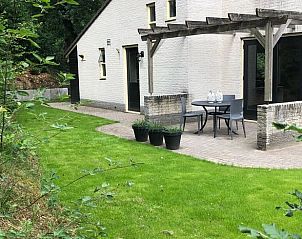 Outdoor terrace with seating at Holiday home in Nunspeet, Veluwe, surrounded by nature.