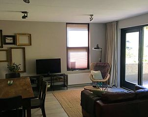 Cozy living room in Holiday home in Nunspeet, Veluwe, with comfortable seating.