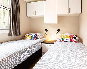 Gezellige tweepersoons slaapkamer in Silva 4 personen Wellness vakantiehuis, Lunteren, Veluwe, met moderne inrichting.