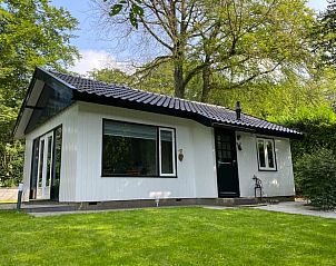 Gezellig vakantiehuisje in Lunteren, Veluwe, omgeven door groen en rust.