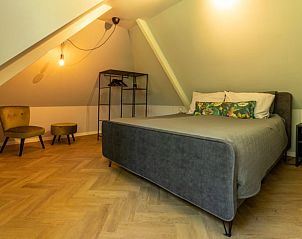 Attractive bedroom in Holiday home in Lunteren, Veluwe, Gelderland with double bed.