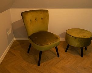 Stylish armchair in Holiday home in Lunteren, Veluwe, Gelderland bedroom.