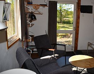 Gezellige woonkamer met veel licht in Het Puttertje, een bed and breakfast in Hattem, Veluwe, Gelderland.