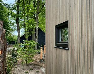 Modern wooden facade of cottage in Lieren, located in Veluwe, Gelderland.