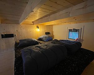 Cozy bedroom in Cottage in Lieren, Veluwe, ideal for a relaxing stay.