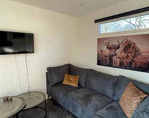 Comfortabele zithoek in vakantiehuis Huisje in Lieren, Veluwe, Gelderland.