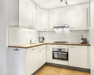 Volledig uitgeruste keuken in Coldenhove bungalow, Eerbeek, Veluwe, met moderne apparatuur.