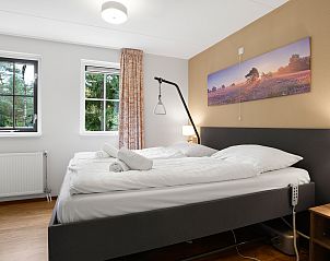 Comfortabele zithoek in Coldenhove vakantiehuis, Eerbeek, Veluwe met uitzicht op de natuur.