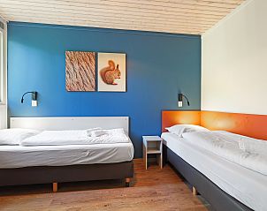 Comfortabele slaapkamer in Rabbit Hill 4-persoons bungalow 4C, Veluwe, met tweepersoonsbed en moderne inrichting.