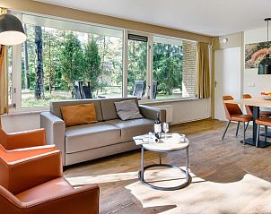 Zithoek en eetgedeelte in Rabbit Hill vakantiehuis, Veluwe, Nieuw Milligen.