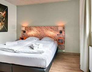 Ruime slaapkamer in Rabbit Hill bungalow, Nieuw Milligen, Veluwe.