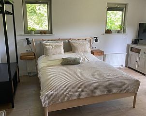 Sfeervolle slaapkamer in Huisje in Nijkerk, vakantiehuis op de Veluwe.