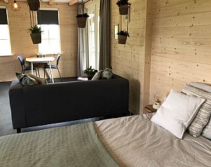 Open woonruimte van Huisje in Nijkerk, vakantiehuis op de Veluwe, ideaal voor gezellig samenzijn.