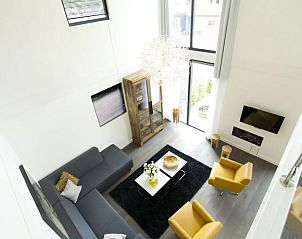 Luchtig uitzicht vanuit de woonkamer van Vakantiehuis Cube Magnifique 8, Nijkerk, Veluwe, Gelderland.