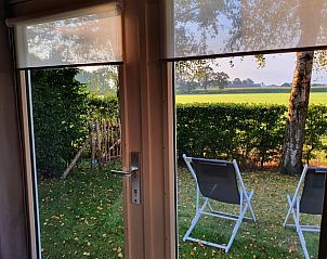 Zicht op de tuin vanuit vakantiehuis Klarenbeek, Veluwe, Gelderland
