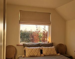 Knusse slaapkamer met zachte kussens in Huisje in Klarenbeek, vakantiehuis in Klarenbeek, Gelderland.