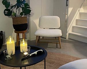 Cozy sitting area with candles in Holiday home in Ugchelen, Veluwe, Gelderland.