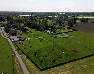 Luchtfoto van Vakantiehuis in Veessen, gelegen in het groene landschap van de Veluwe, Gelderland.
