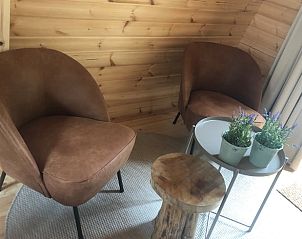 Comfortabele zithoek in Vakantiehuisje in Terschuur, Veluwe, voor ultieme ontspanning.