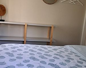 Slaapkamer in Robbenoort 121 Lauwersoog de Merel, vakantiehuis in Groningen met stijlvol beddengoed.