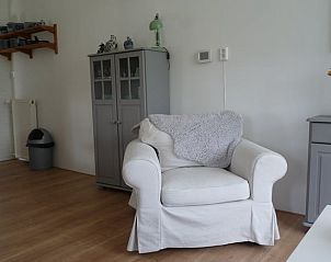 Comfortabele zithoek in Vakantiehuis in Ter Apel, ideale plek om te ontspannen.