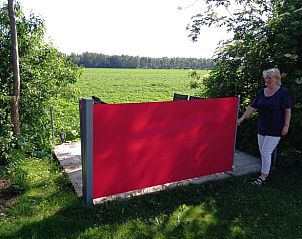 Beschut terras bij Vakantiehuis in Ter Apel, perfect voor buiten dineren in Zuidoost Groningen.
