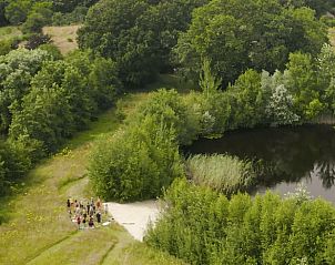 Luchtfoto van groene omgeving bij Vakantiehuis in Bellingwolde, Groningen.