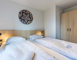 Tweede slaapkamer in de Vrijstaande woning in Sellingen, vakantiehuis in Zuidoost Groningen met kast.