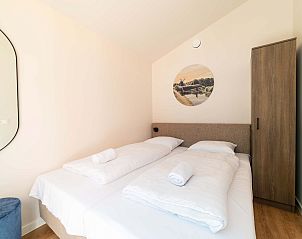 Tweede slaapkamer in Vrijstaande woning in Sellingen met comfortabele bedden in Groningen.