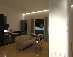 Ruim terras met ligstoelen bij vrijstaande woning in Sellingen, Zuidoost Groningen, Groningen.