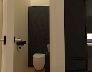 Zonsondergang over vakantiepark in groene omgeving van Sellingen, Zuidoost Groningen, Groningen.