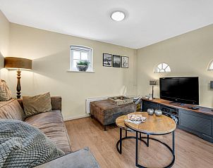 Sfeervolle decoraties in woonkamer van Rutershoeske, Veendam.