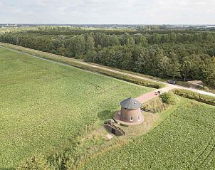 GR029 vakantiehuis in Tripscompagnie, Groningen biedt een serene omgeving met groene bossen en velden.