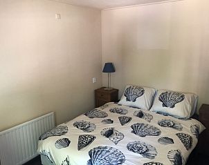 Gezellige slaapkamer in Huisjeaanhetmeer.nl vakantiehuis in Haren, Zuidwest Groningen voor een rustgevende nachtrust.