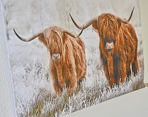 Ruime woonkamer met eethoek in Villa Christina in Stevensweert, Midden Limburg.