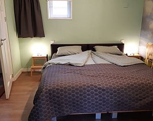 Gezellige slaapkamer in Vakantiehuisje in Nederweert, Limburg. Rust en comfort in deze vakantiewoning.