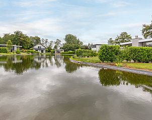 Detached house in Susteren, Central Limburg, waterfront vacation home with serene nature and beautiful lake views.