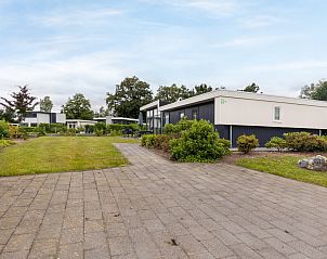 Detached house in Susteren, a vacation home in Central Limburg, surrounded by green nature and a spacious terrace for relaxation.
