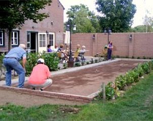 Outdoor activities at Apartment Green, Blue or Red in Horst, Limburg with bocce court and seating areas.
