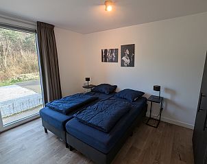 Ruime slaapkamer met natuurzicht in de vrijstaande woning in Belfeld.