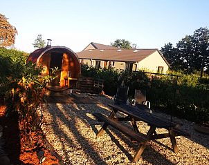 Rustieke sauna en tuin bij Vakantiehuis in America, Limburg.