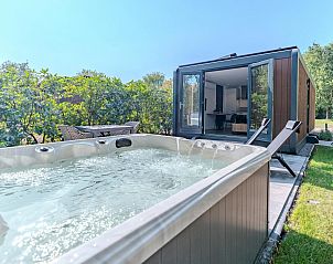 Enjoy luxury in Bos Cabin with Jacuzzi for 2 people in Maasbree, North Limburg, vacation home with beautiful terrace and surrounding nature.