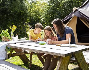 Enjoy on the terrace of Glamptent in Maasbree, North Limburg, a cozy glamping lodge for 4 people surrounded by nature.